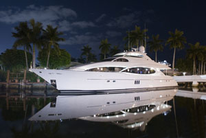 a super yacht at night