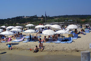 The beach at Club 55 as seen from the pier