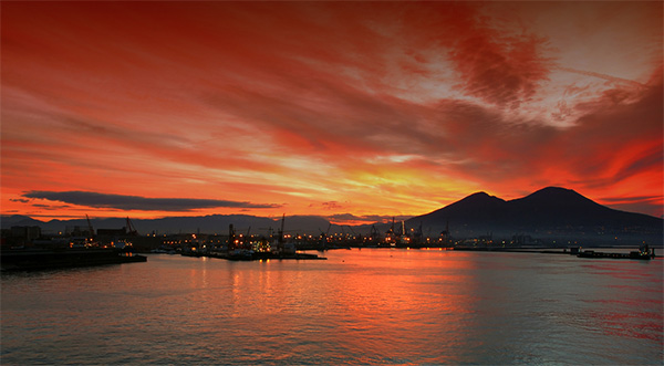Dramatic Sunset behind the iconic image of Mount Vesuvius