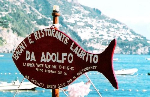 The fish mounted on the mast of the shuttle boat service to Da Adolfo, Positano