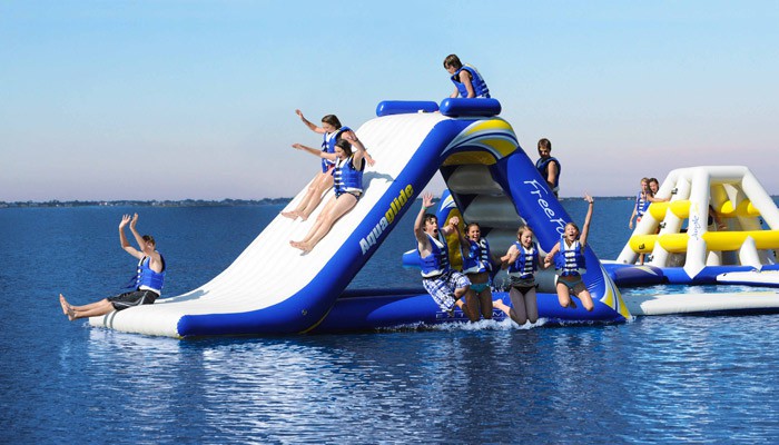 Enjoy inflatable playgrounds floating in the sea by your yacht!