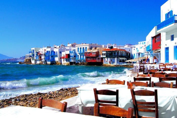 Dine on Greek specialties with your feet almost in the water!