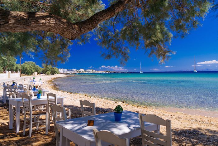 Sit back in the Greek sunshine and enjoy lunch in a typical taverna