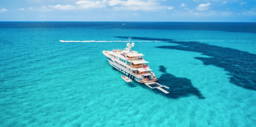 Luxury Motor Yacht Anchored in the Maldives featuring Sea Pool and Yacht Toys and Tender