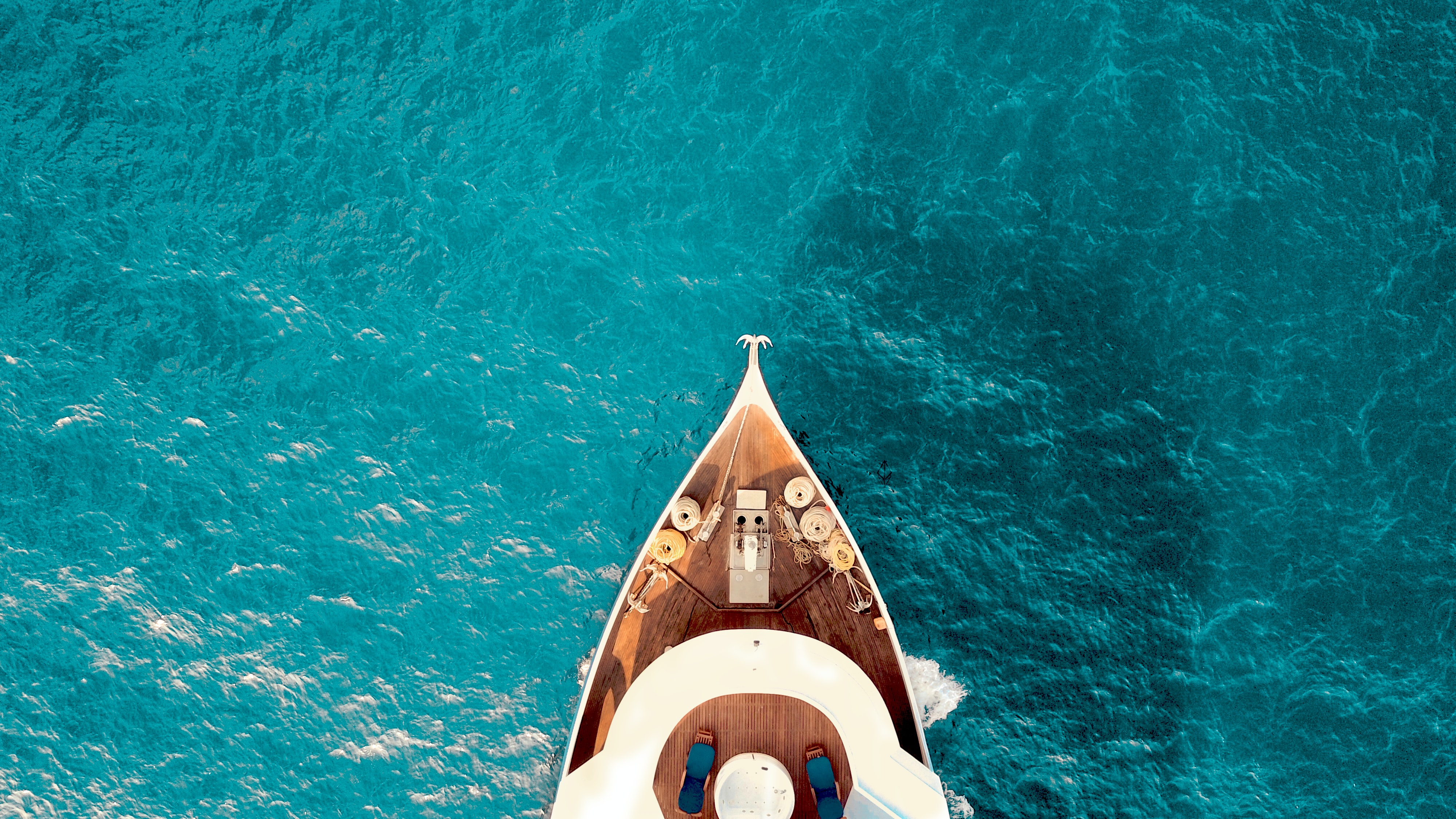 Aerial Shot of Luxury Crewed Motor Yacht Charter Cruising