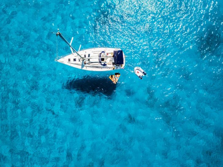 ibiza beach, ibiza yacht party, ibiza yacht charter, ibiza crewed catamaran