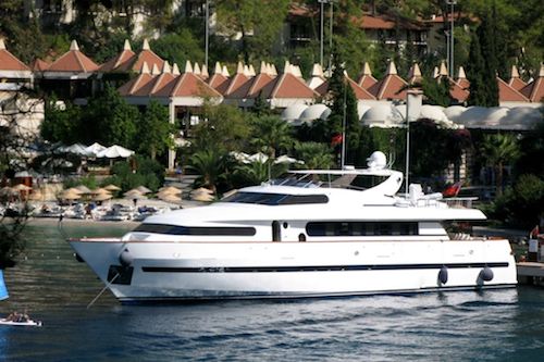 Beautifully proportioned Bugari 100 at anchor near beautiful Thai Islands