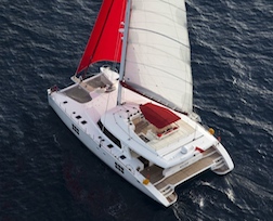 Striking Sunreef catamaran performing well under sail