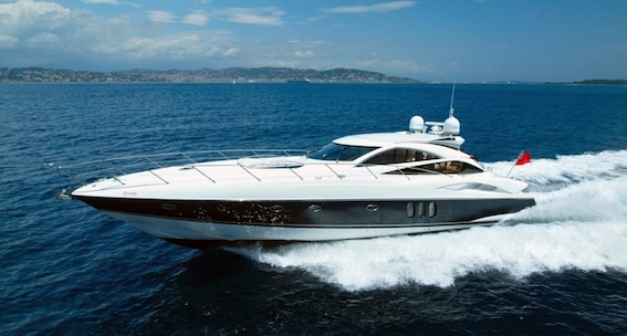 Luxury Sunseeker Crewed Motor Yacht REHAB at speed passing Cannes