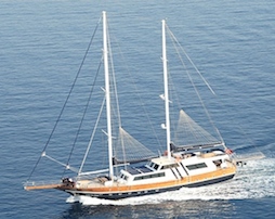Majestic motor-sailor in the blue waters surrounding Greece
