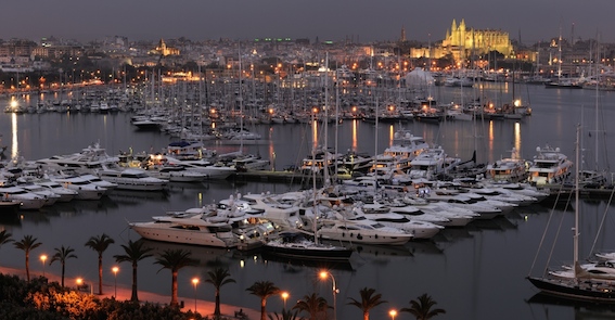 The beautiful historic port of Palma coloured with luxury motor and sailing yachts